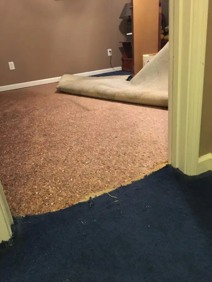 Carpet pad removal revealing water damage during Drying & Dehumidification in Stayton
